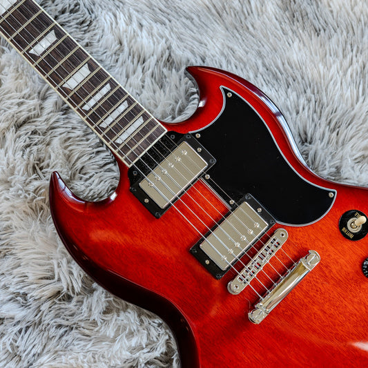 Standard tune-o-matic bridge and stopbar tailpiece on a Gibson SG, the hardware a locking kit replaces