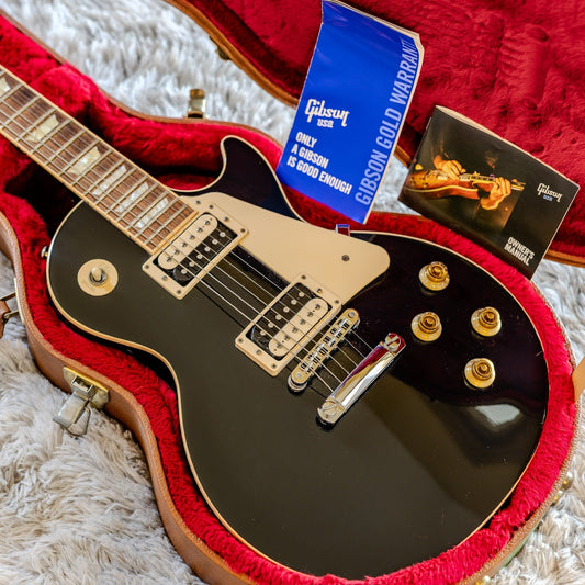 Gibson Les Paul Traditional Pro Exclusive in Ebony showing plain maple top and push-pull volume controls