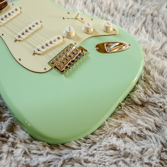 Vintage six-screw synchronized tremolo bridge on a Surf Green Fender Stratocaster, the hardware at the center of the float versus block debate