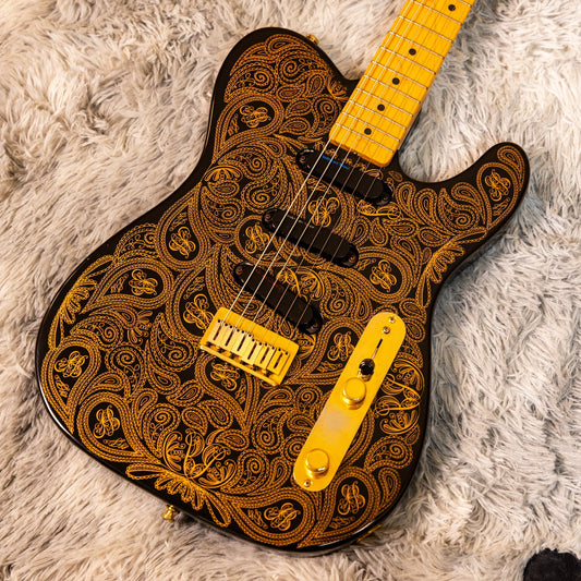 Fender James Burton Signature Telecaster in black with gold paisley finish showing three Lace Sensor pickups