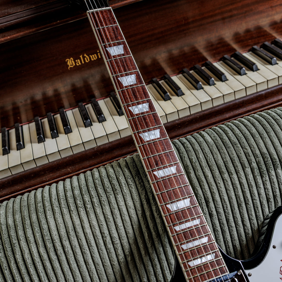 Bound torrefied granadillo fretboard with trapezoid inlays on a 2018 Gibson Firebird