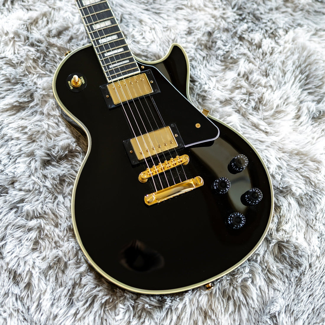 Epiphone Inspired by Gibson Custom Les Paul Custom in Ebony with gold hardware, front view