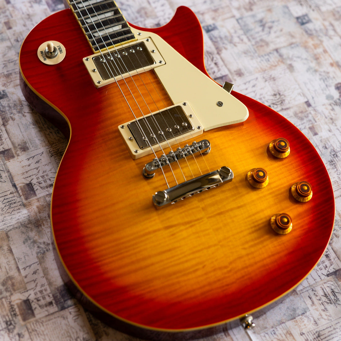 Used Epiphone Les Paul Standard Plus Top in heritage cherry sunburst on the bench at Aeonic Frets