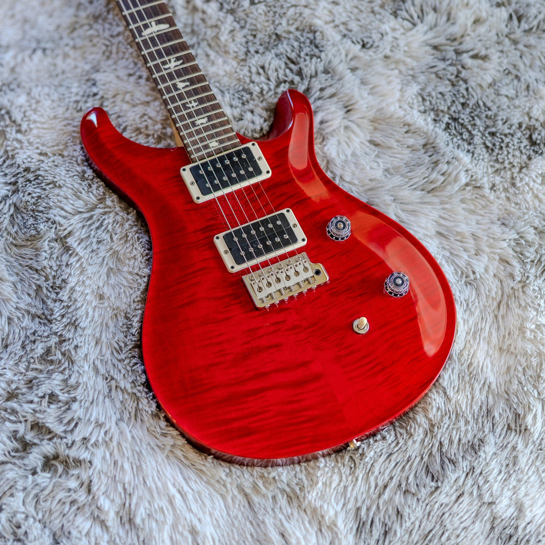 PRS CE 24 in Scarlet Red with a flame maple top, front view