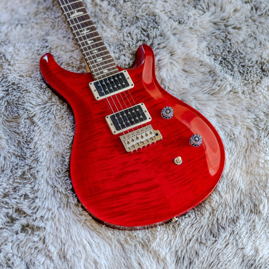PRS CE 24 in Scarlet Red with a flame maple top, front view