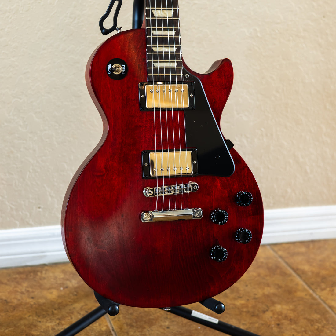 Gibson Les Paul Studio Faded in Worn Cherry satin finish, a used guitar in stock at Aeonic Frets