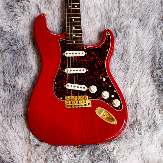 Fender Deluxe Super Stratocaster with Rosewood Fretboard 1997 - 2004 - Crimson Transparent